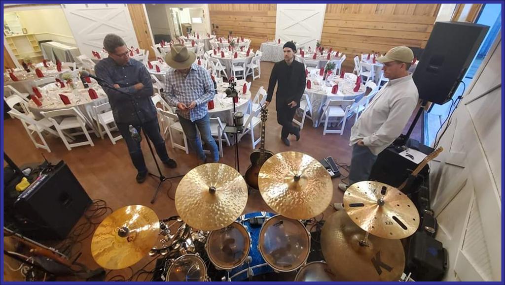 The Blue Moon Band preparing to entertain guests at a beautiful wedding reception. 